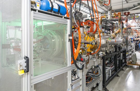 The new IOTA proton injector integrates a low-voltage proton source and a high-frequency quadrupole accelerator to deliver a high-intensity beam to the IOTA ring. Credit: Ryan Postel, Fermilab