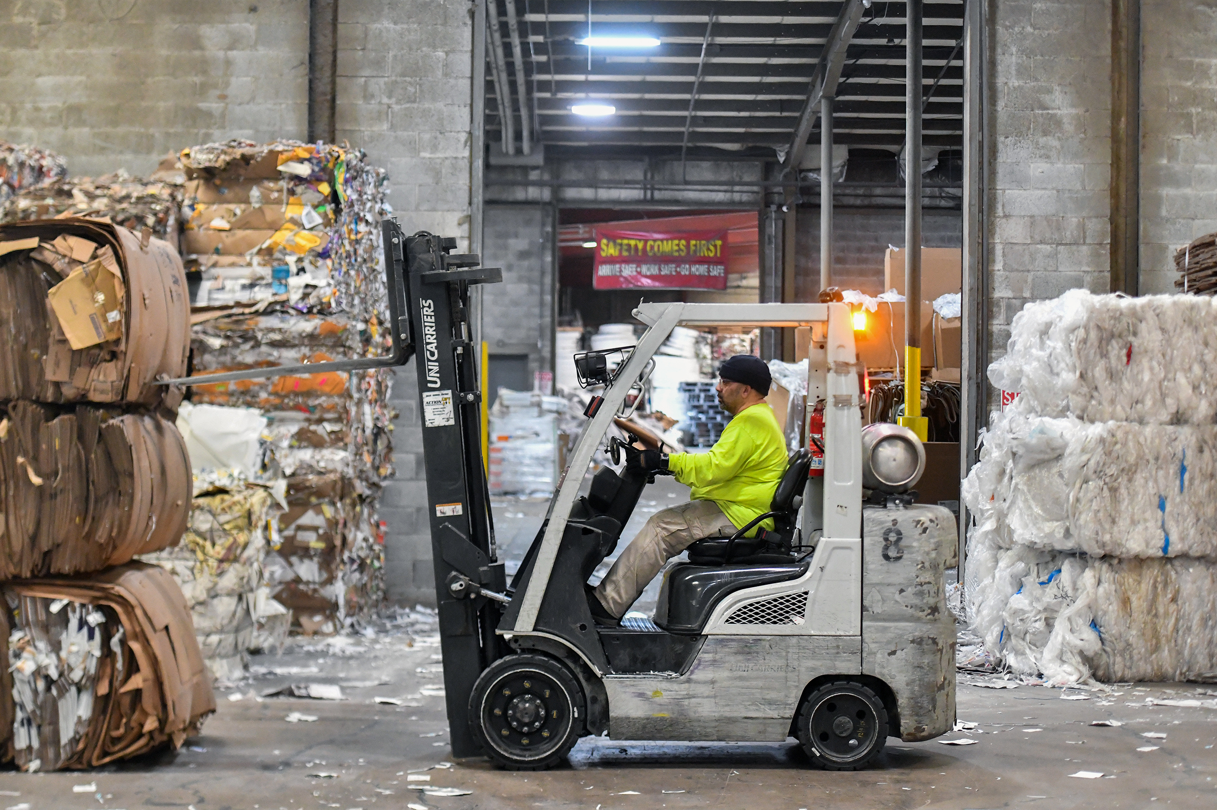 Employee Ben Ramos operates a forklift in the warehouse...