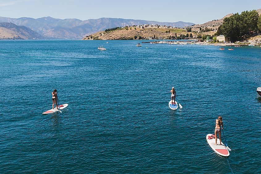 Paddle boarders on Lake Chelan in Washington state.