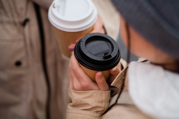 people with coffee cups